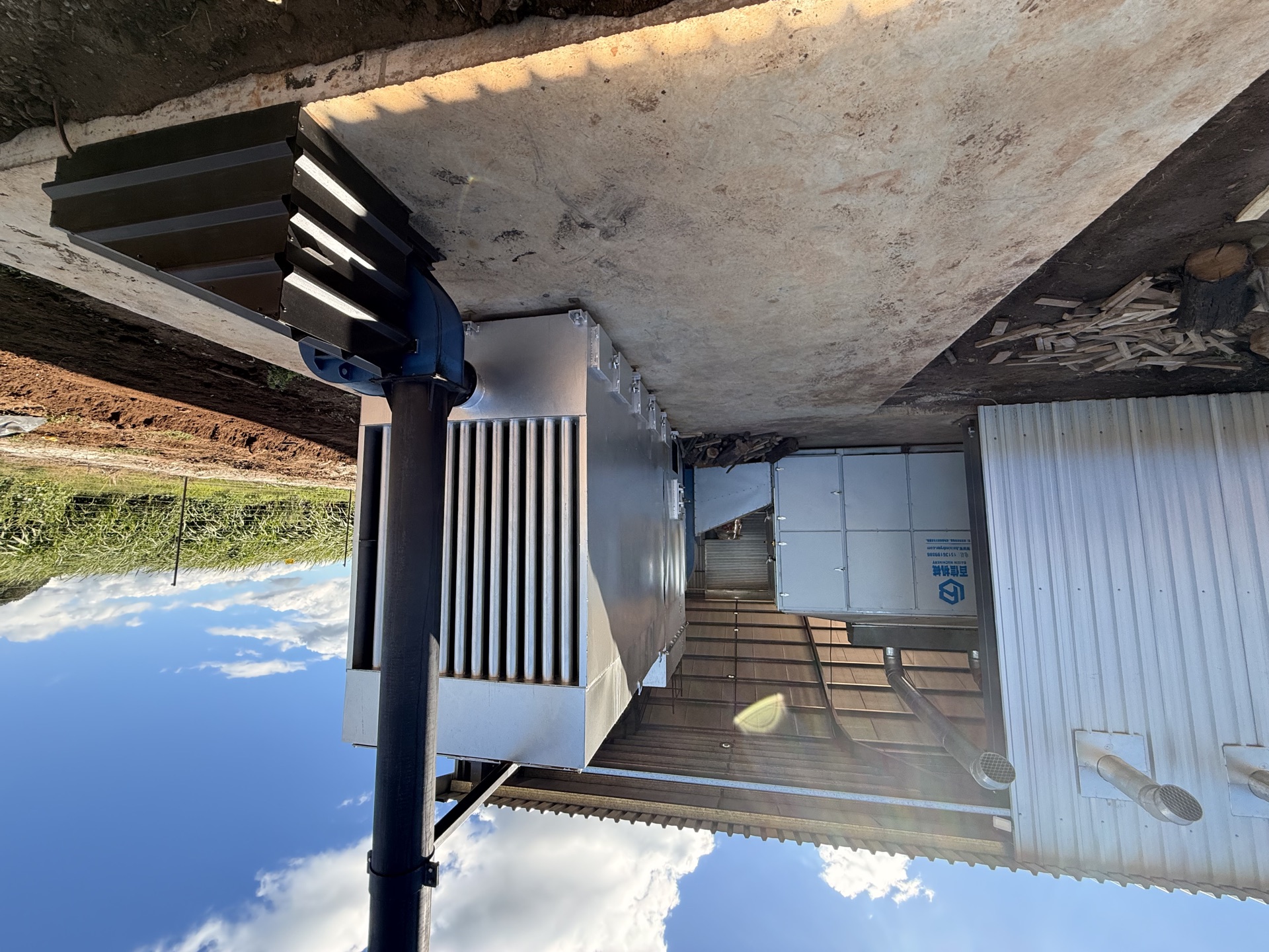 Close view of an extractor fan unit on the facility wall